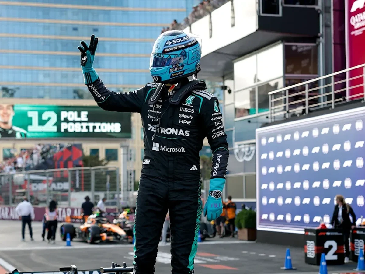 George Russell celebrates after claiming pole position for the 2026 Azerbaijan Grand Prix in Baku.