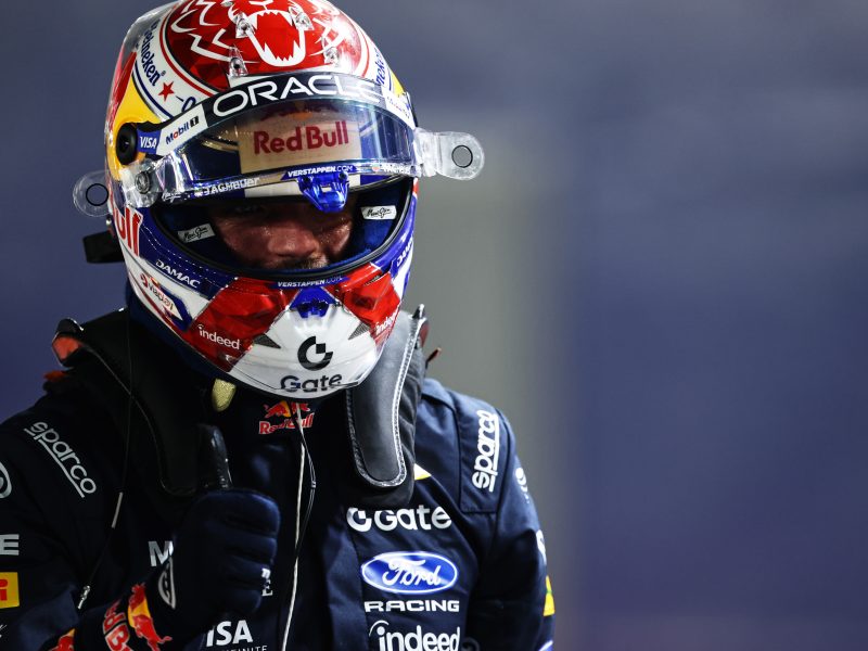 Max Verstappen celebrates after securing pole position for the Sprint at the 2026 Singapore Grand Prix at Marina Bay.